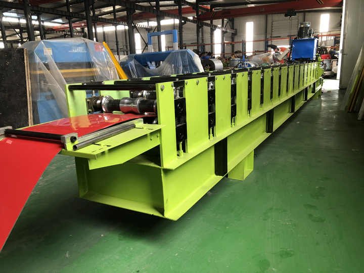 Ridge making machine for metal roof